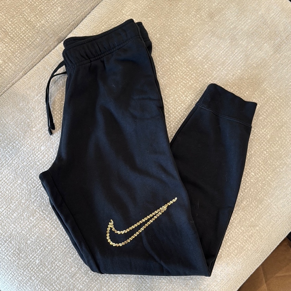 Nike Black Joggers with Gold Swoosh